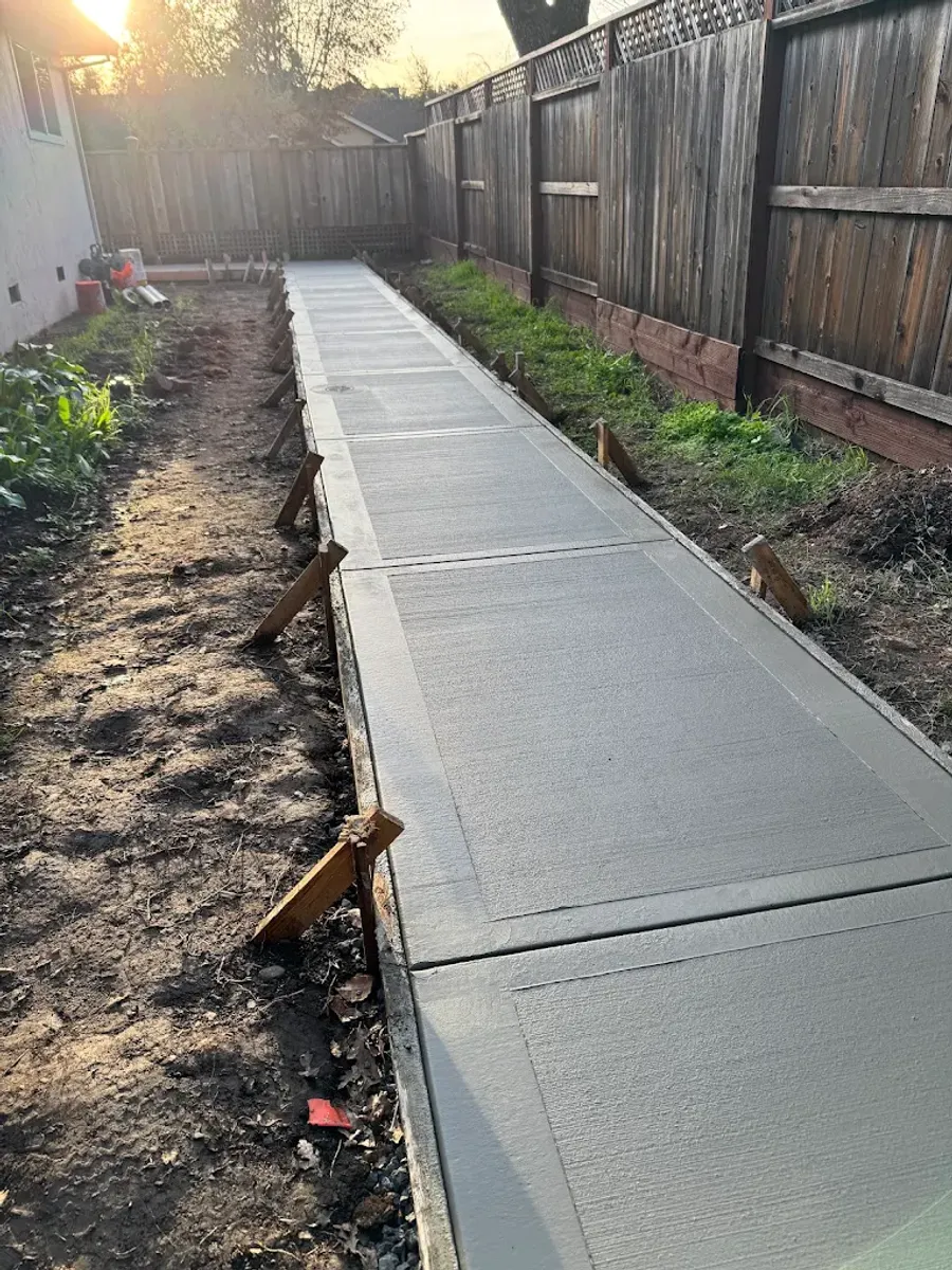 Broom-finished concrete path with evenly spaced joints
